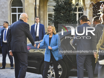 Lebanese Prime Minister Najib Mikati welcomes his Italian counterpart Giorgia Meloni ahead of their meeting at the Beirut governmental palac...