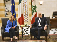 Lebanese Prime Minister Najib Mikati welcomes his Italian counterpart Giorgia Meloni ahead of their meeting at the Beirut governmental palac...