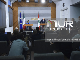 Lebanese Prime Minister Najib Mikati welcomes his Italian counterpart Giorgia Meloni ahead of their meeting at the Beirut governmental palac...