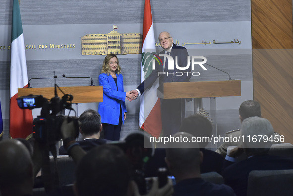 Lebanese Prime Minister Najib Mikati welcomes his Italian counterpart Giorgia Meloni ahead of their meeting at the Beirut governmental palac...