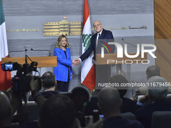 Lebanese Prime Minister Najib Mikati welcomes his Italian counterpart Giorgia Meloni ahead of their meeting at the Beirut governmental palac...