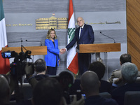 Lebanese Prime Minister Najib Mikati welcomes his Italian counterpart Giorgia Meloni ahead of their meeting at the Beirut governmental palac...