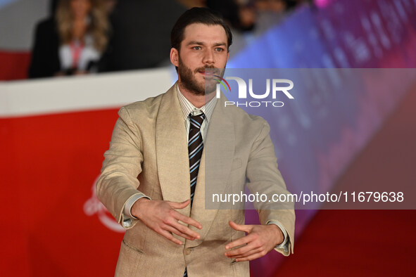 Lorenzo Richelmy and a guest attend the ''FINO ALLA FINE'' red carpet during the 19th Rome Film Festival at Auditorium Parco Della Musica in...