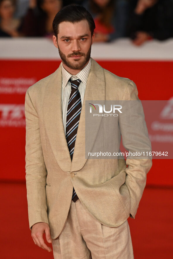 Lorenzo Richelmy and a guest attend the ''FINO ALLA FINE'' red carpet during the 19th Rome Film Festival at Auditorium Parco Della Musica in...