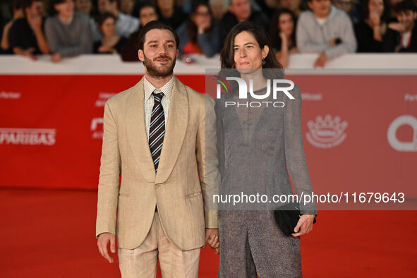 Lorenzo Richelmy and a guest attend the ''FINO ALLA FINE'' red carpet during the 19th Rome Film Festival at Auditorium Parco Della Musica in...