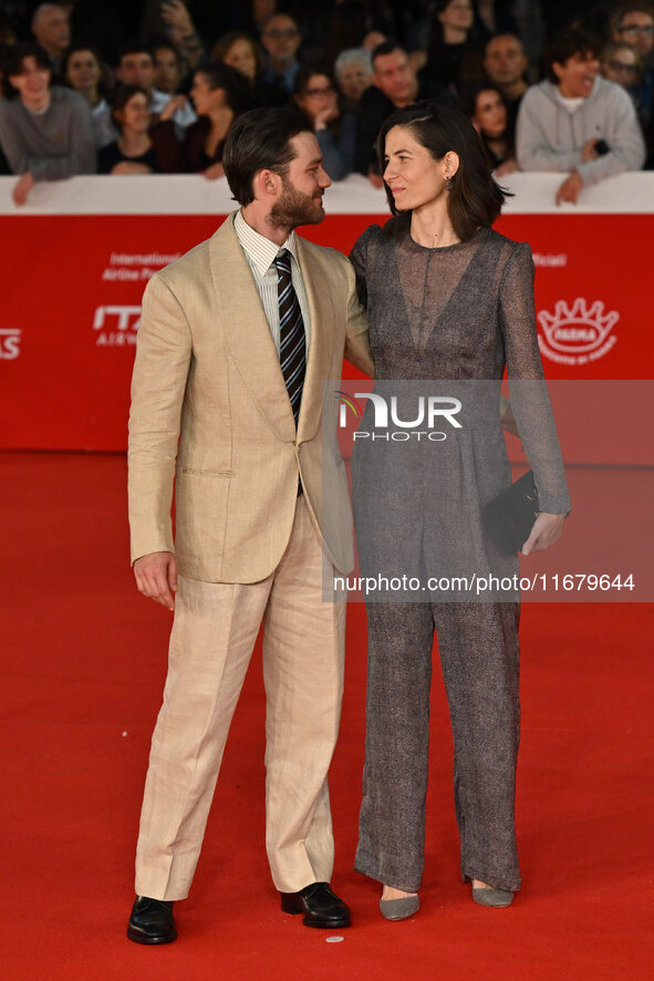 Lorenzo Richelmy and a guest attend the ''FINO ALLA FINE'' red carpet during the 19th Rome Film Festival at Auditorium Parco Della Musica in...