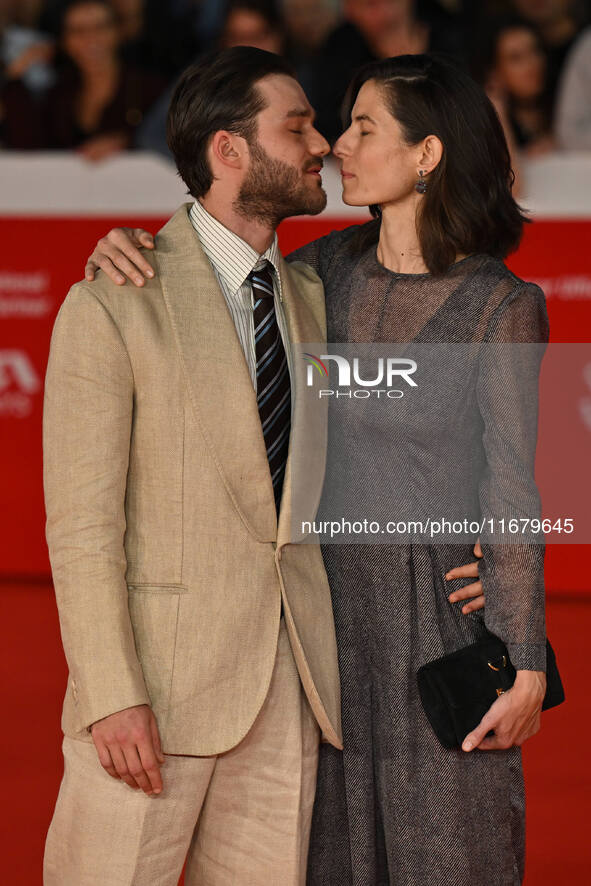 Lorenzo Richelmy and a guest attend the ''FINO ALLA FINE'' red carpet during the 19th Rome Film Festival at Auditorium Parco Della Musica in...