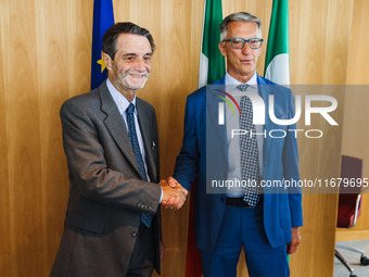 Attilio Fontana and Giuseppe Ricci attend the signing of the memorandum of understanding between Regione Lombardia and Eni SpA at Palazzo Lo...