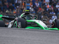 Guanyu Zhou of China drives the (24) Stake F1 Team Kick Sauber C44 Ferrari during the Formula 1 Pirelli United States Grand Prix 2024 in Aus...