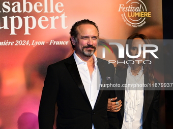 Vincent Perez and Karine Silla Perez at the light festival award ceremony in Lyon, France, on October 19, 2024. (