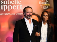 Vincent Perez and Karine Silla Perez at the light festival award ceremony in Lyon, France, on October 19, 2024. (