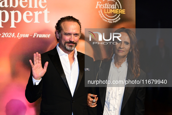 Vincent Perez and Karine Silla Perez at the light festival award ceremony in Lyon, France, on October 19, 2024. 