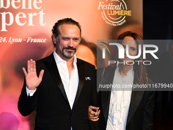 Vincent Perez and Karine Silla Perez at the light festival award ceremony in Lyon, France, on October 19, 2024. (