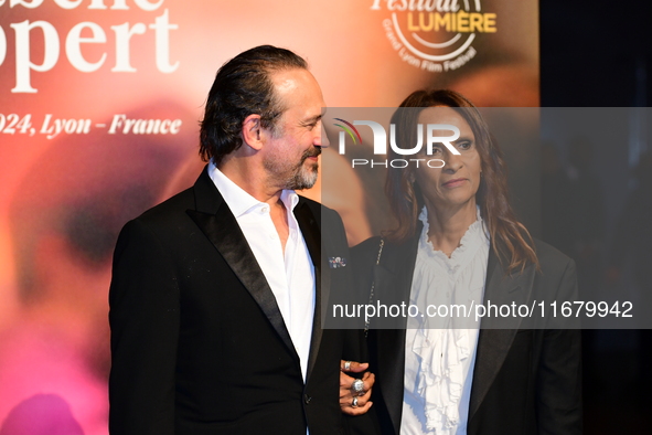 Vincent Perez and Karine Silla Perez at the light festival award ceremony in Lyon, France, on October 19, 2024. 