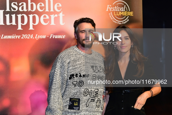 James Franco and Isabel Paksad at the light festival award ceremony in Lyon, France, on October 19, 2024. 