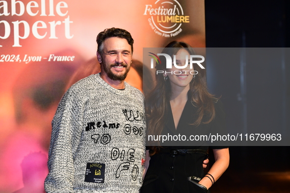 James Franco and Isabel Paksad at the light festival award ceremony in Lyon, France, on October 19, 2024. 