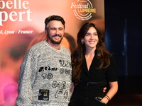 James Franco and Isabel Paksad at the light festival award ceremony in Lyon, France, on October 19, 2024. (