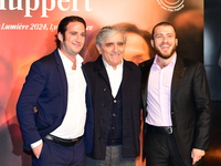 Isabelle Huppert's family at the light festival award ceremony in Lyon, France, on October 19, 2024. (