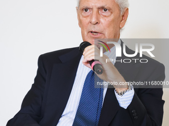 Pirelli CEO Marco Tronchetti Provera attends the press presentation of the mural Waves Only Exist Because the Wind Blows by eL Seed on the e...