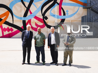 Pirelli CEO Marco Tronchetti Provera and eL Seed attend the press presentation of the mural Waves Only Exist Because the Wind Blows by eL Se...