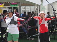 Alejandra Valencia of Mexico and Yang Xialoei of China participate in the practice session before the competition on the first day of the Tl...