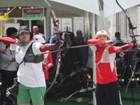 Alejandra Valencia of Mexico and Yang Xialoei of China participate in the practice session before the competition on the first day of the Tl...