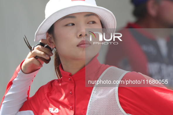 Yang Xialoei of China participates in the practice session before the competition against Alejandra Valencia of Mexico (not in picture) on t...