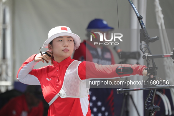 Yang Xialoei of China participates in the practice session before the competition against Alejandra Valencia of Mexico (not in picture) on t...