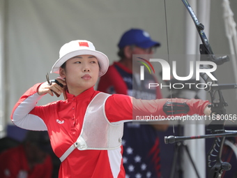 Yang Xialoei of China participates in the practice session before the competition against Alejandra Valencia of Mexico (not in picture) on t...