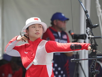 Yang Xialoei of China participates in the practice session before the competition against Alejandra Valencia of Mexico (not in picture) on t...