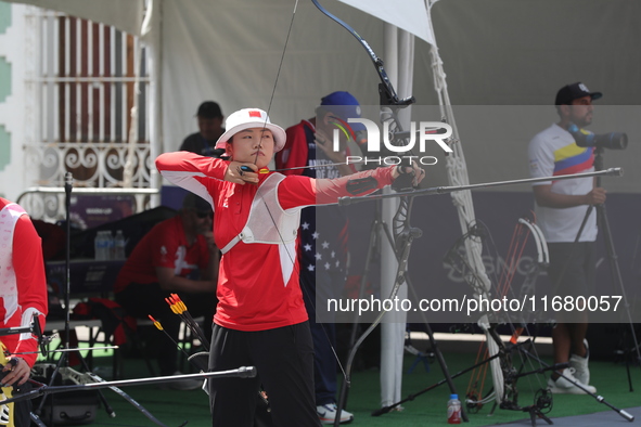 Yang Xialoei of China participates in the practice session before the competition against Alejandra Valencia of Mexico (not in picture) on t...