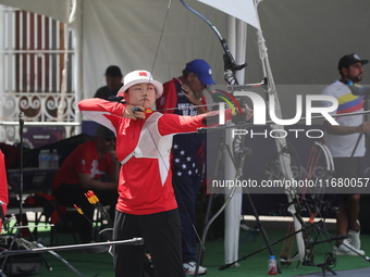 Yang Xialoei of China participates in the practice session before the competition against Alejandra Valencia of Mexico (not in picture) on t...