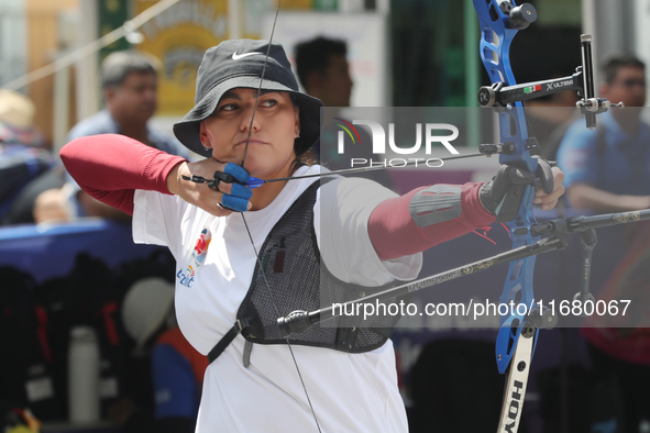 Alejandra Valencia of Mexico practices before the competition against Yang Xialoei of China (not in picture) on the first day of the Tlaxcal...