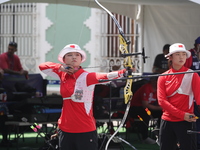 Li Jiaman and Yang Xialoei of China participate in the practice session before the competition on the first day of the Tlaxcala 2024 Archery...