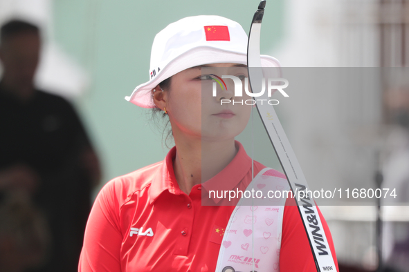 Li Jiaman of China participates in the practice session before the competition against Deepika Kumari of India (not in picture) on the first...