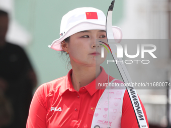 Li Jiaman of China participates in the practice session before the competition against Deepika Kumari of India (not in picture) on the first...