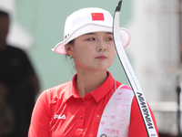 Li Jiaman of China participates in the practice session before the competition against Deepika Kumari of India (not in picture) on the first...