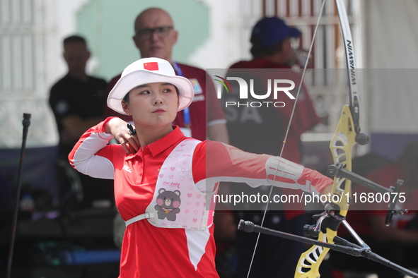 Li Jiaman of China participates in the practice session before the competition against Deepika Kumari of India (not in picture) on the first...