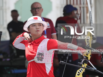 Li Jiaman of China participates in the practice session before the competition against Deepika Kumari of India (not in picture) on the first...