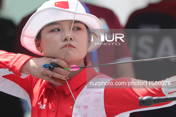 Li Jiaman of China participates in the practice session before the competition against Deepika Kumari of India (not in picture) on the first...