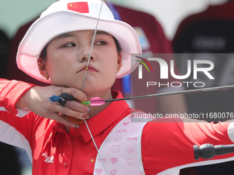 Li Jiaman of China participates in the practice session before the competition against Deepika Kumari of India (not in picture) on the first...