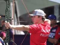 Mathias Fullerton of Denmark participates in the practice session before the competition against Mike Schloesser of the Netherlands (not in...