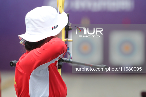 Li Jiaman of China participates in the practice session before the competition against Deepika Kumari of India (not in picture) on the first...