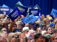 Waterford, MICHIGAN - OCTOBER 18: Attendees hold up signs where US Vice President and Democratic presidential candidate Kamala Harris held t...