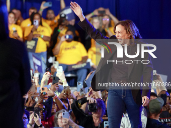 Waterford, MICHIGAN - OCTOBER 18: US Vice President and Democratic presidential candidate Kamala Harris enters the Oakland County campaign r...