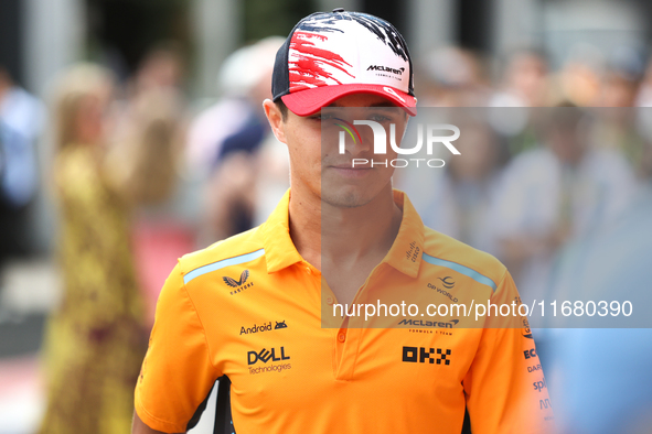 Lando Norris walks through the paddock at Circuit of the Americas in Austin, Texas, on October 18, 2024, during the Formula 1 Pirelli United...