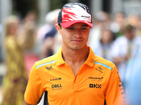 Lando Norris walks through the paddock at Circuit of the Americas in Austin, Texas, on October 18, 2024, during the Formula 1 Pirelli United...