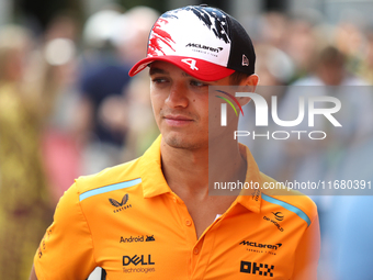 Lando Norris walks through the paddock at Circuit of the Americas in Austin, Texas, on October 18, 2024, during the Formula 1 Pirelli United...