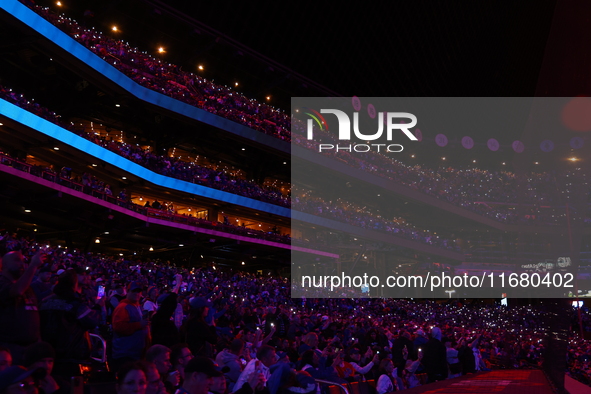 The New York Mets turn off the lights of the ballpark in the seventh inning in Game 5 of the baseball NL Championship Series against the Los...