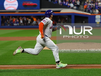 Francisco Alvarez #4 of the New York Mets scores during the third inning in Game 5 of the baseball NL Championship Series against the Los An...